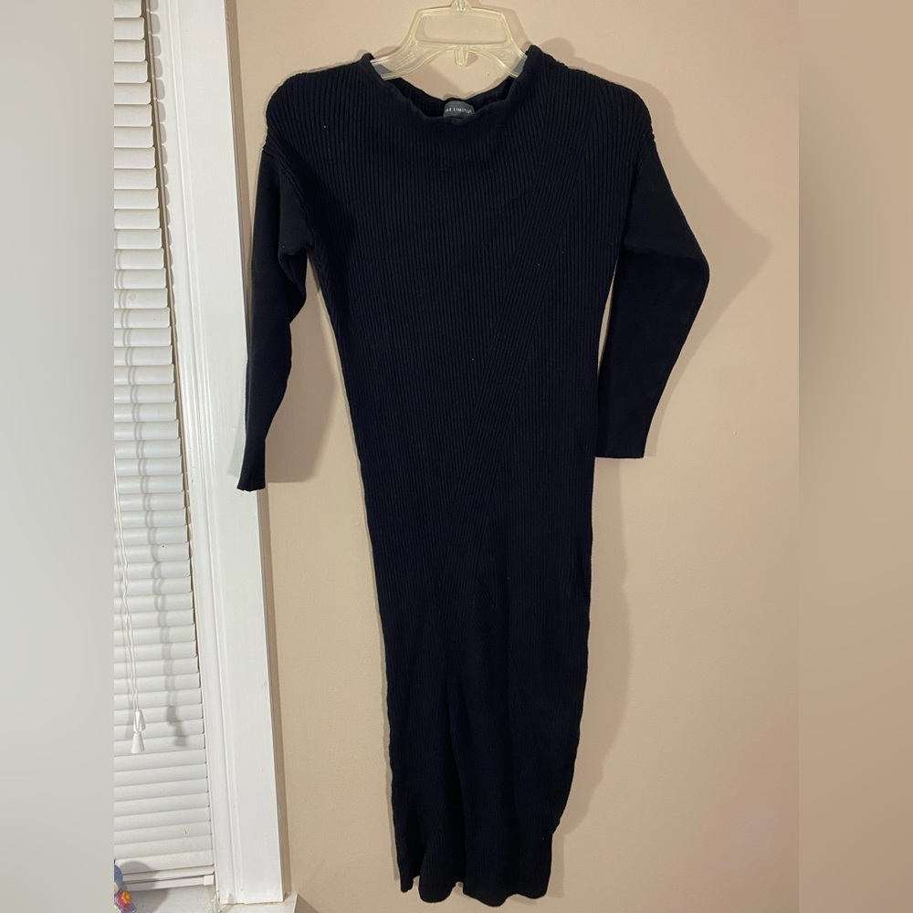 The limited black sweater dress